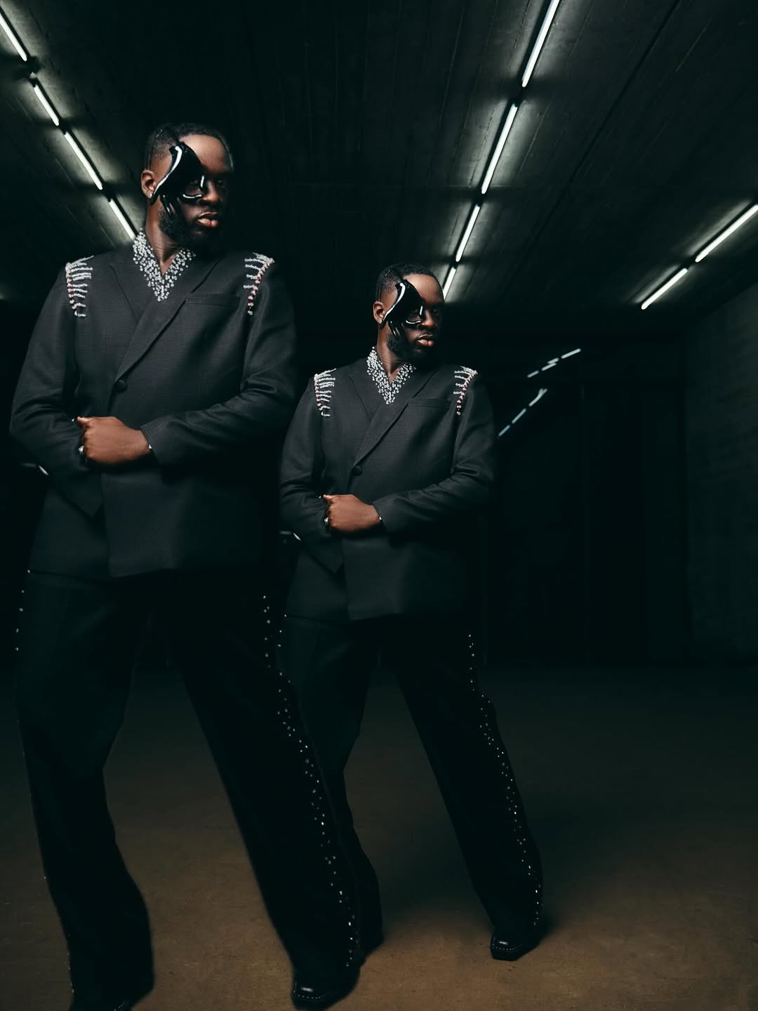 LAKOPUÉ mirrored silhouettes in tunnel light